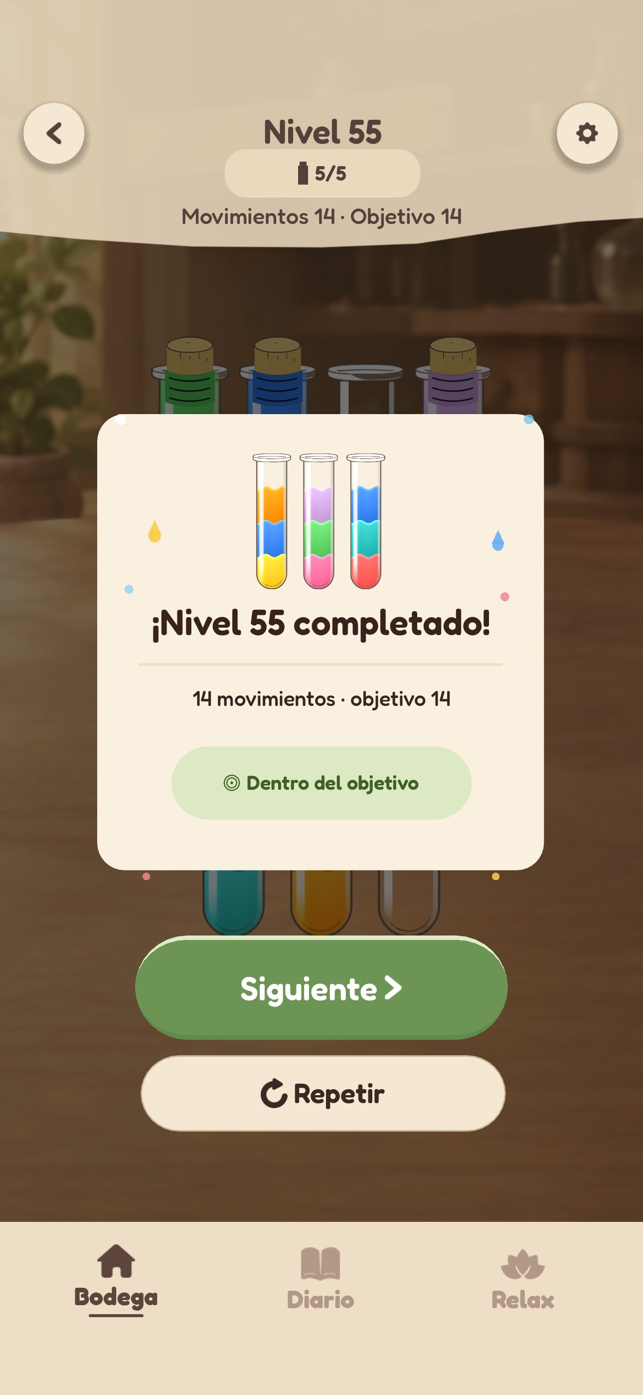 Pantalla de nivel completado en Vidrio con la insignia «Dentro del objetivo»